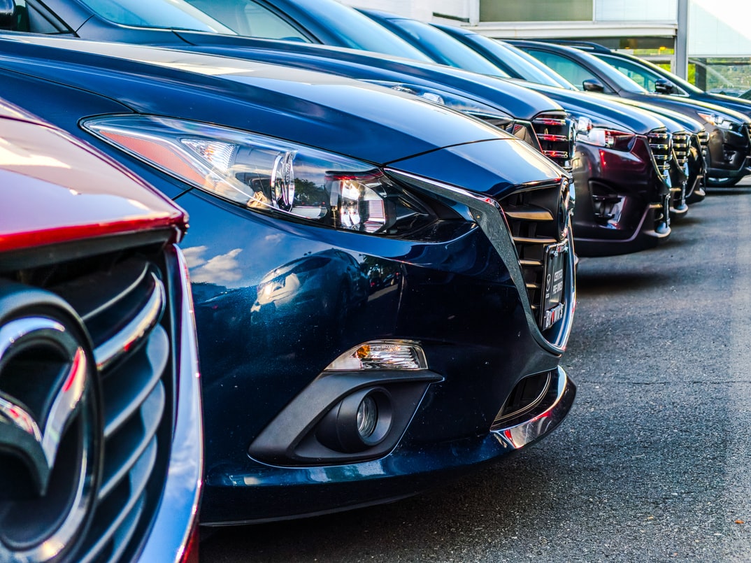 a row of Mazda cars