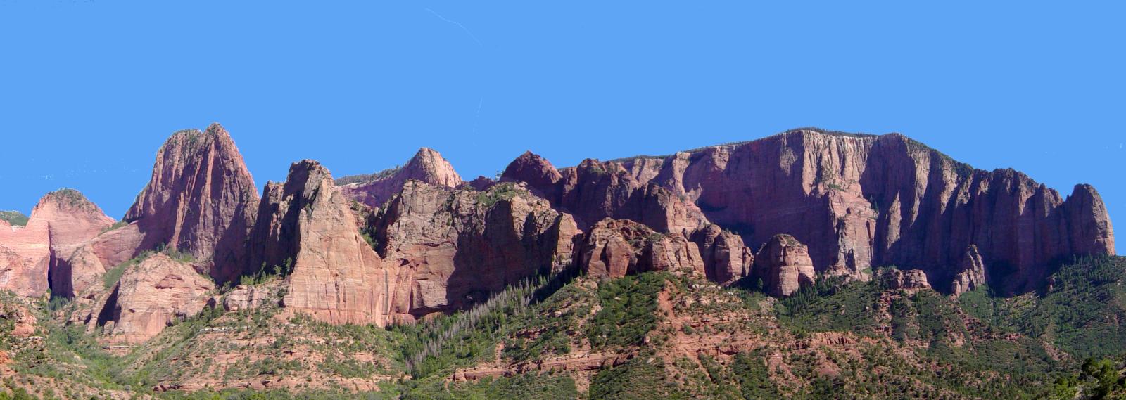 The Kolob Canyons are a set of finger canyons cut into the Kolob Plateau. Timber Top Mountain to right