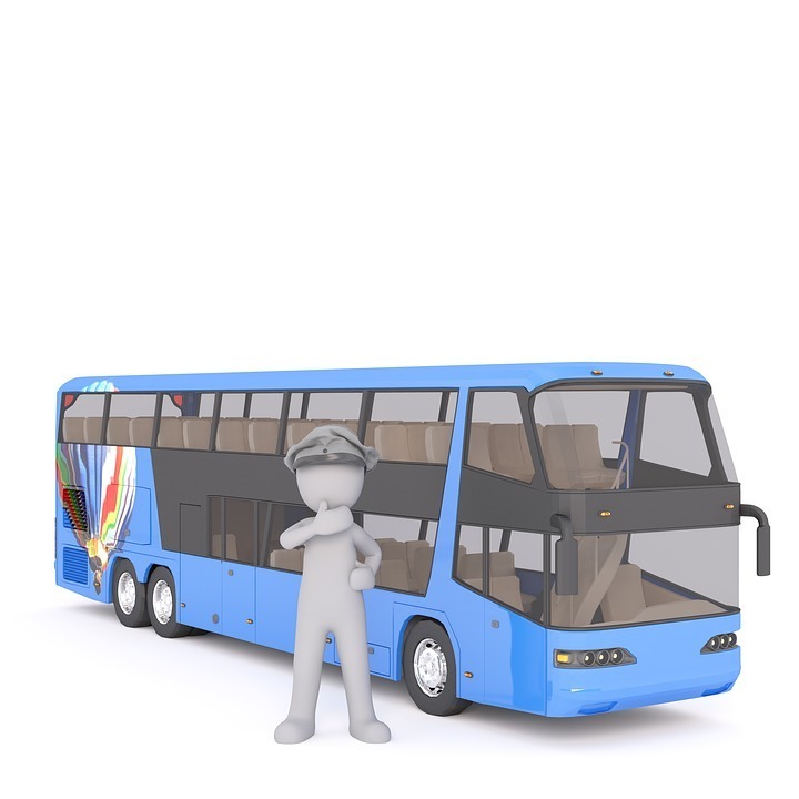 an illustration of a shuttle bus with a person standing in front of the bus