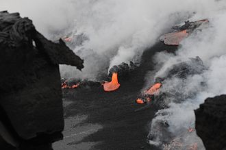 black-sand-forming-when-lava-hits-ocean